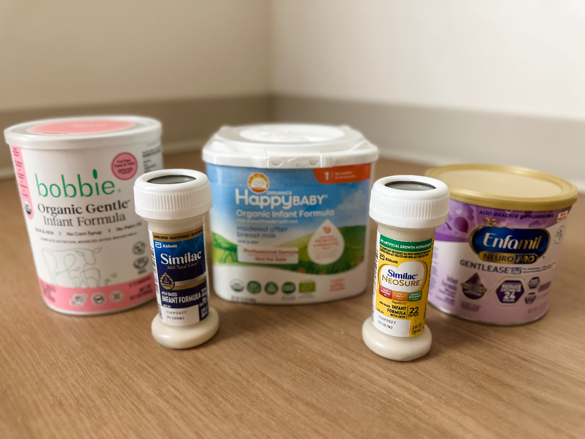 Infant formula containers and ready-to-feed bottles