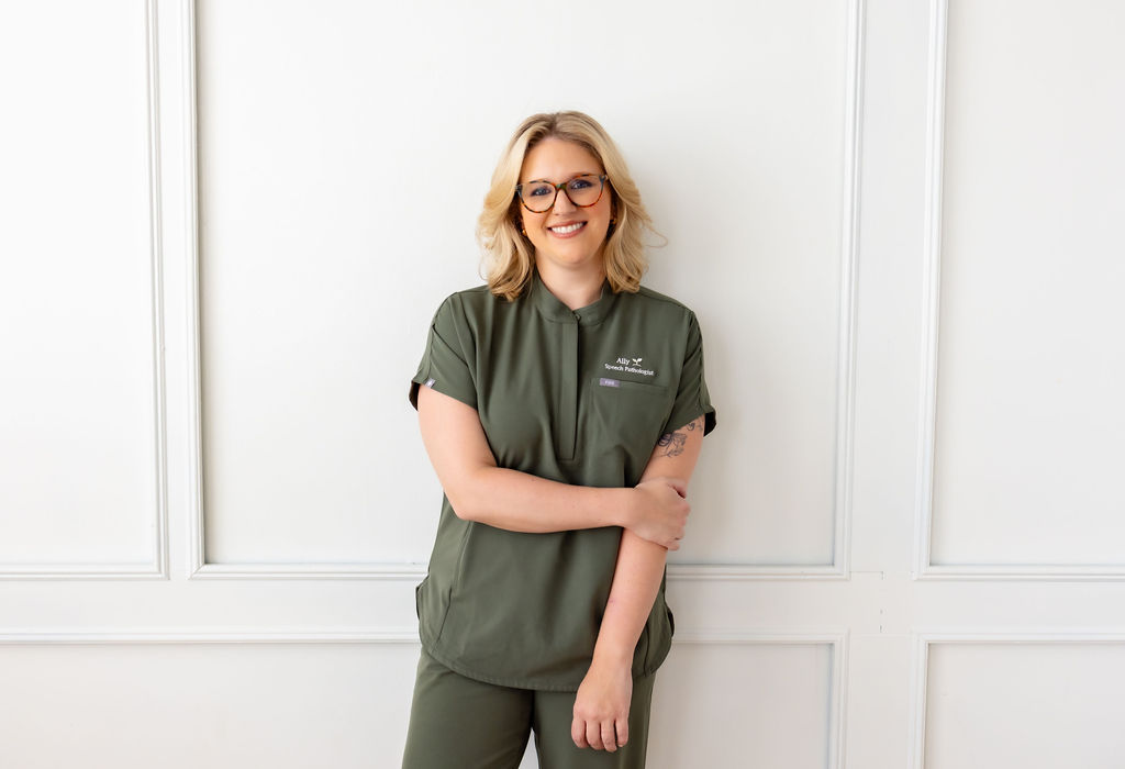 Portrait of Ally Gore in green scrubs