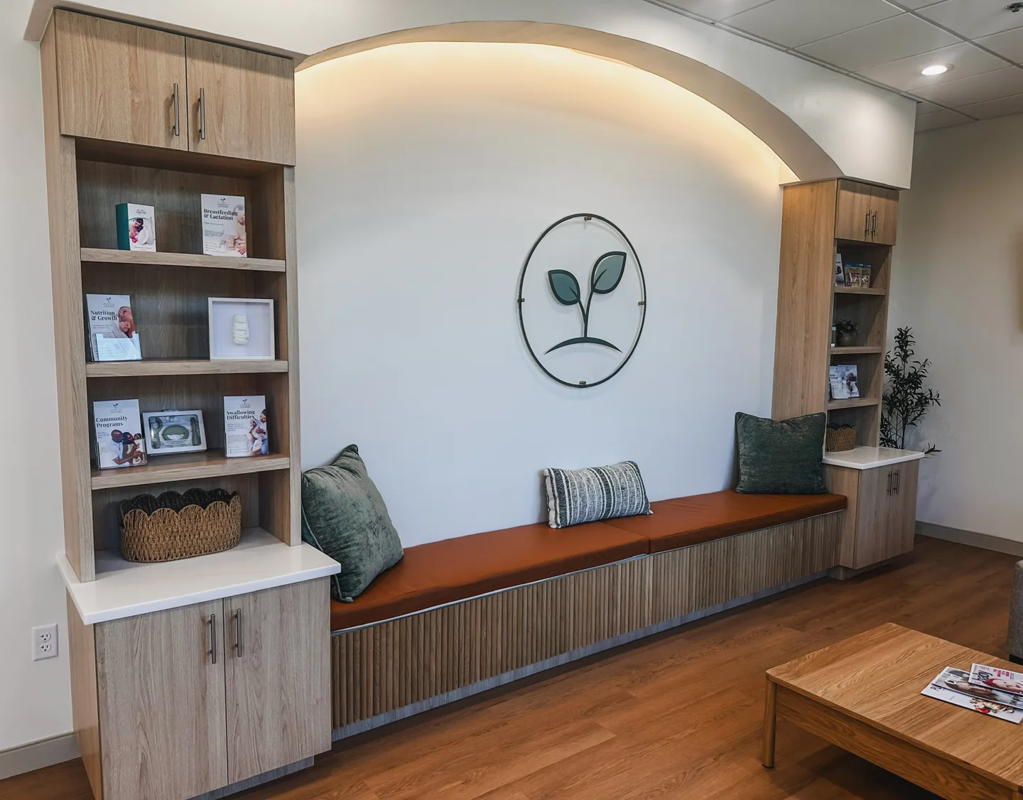Institute logo above the built-in bench in the waiting area